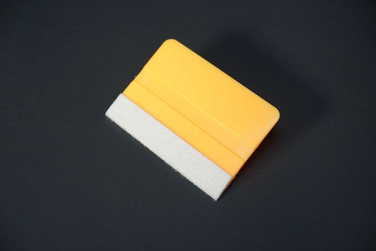 Plastic rakel (geel) met soft strip